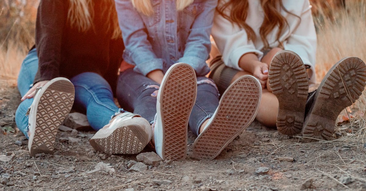 How are macaron feet formed? - 2 Women Sitting on Ground