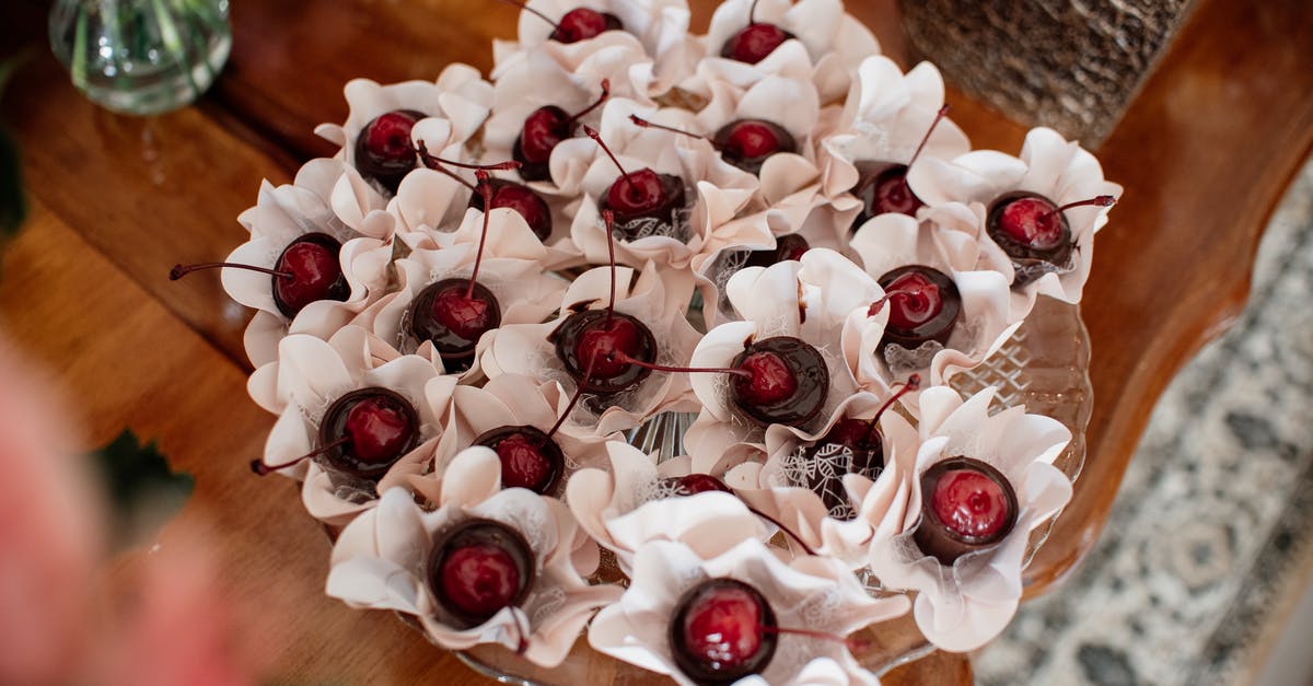 How are maraschino cherries pitted? - White and Red Flower Bouquet