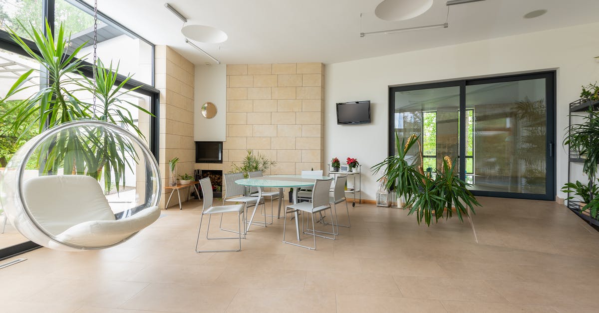 How can I achieve large bubbles in my bread? [duplicate] - Interior of spacious apartment with bubble chair and green plants