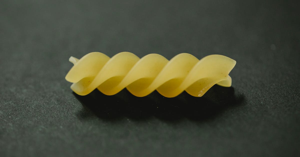 How can I best dry homemade extruded pasta? - Pice of fusilli pasta placed on table