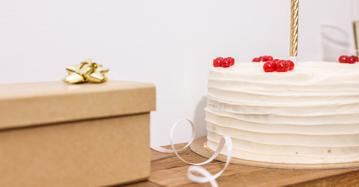 How can I bolster up a boxed cake mix? - A Close-Up Shot of a Cake and a Gift Box