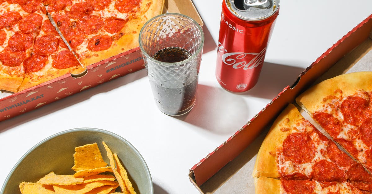 How can I create a sweet pizza that looks like pizza? - Coca Cola Can Beside Clear Drinking Glass