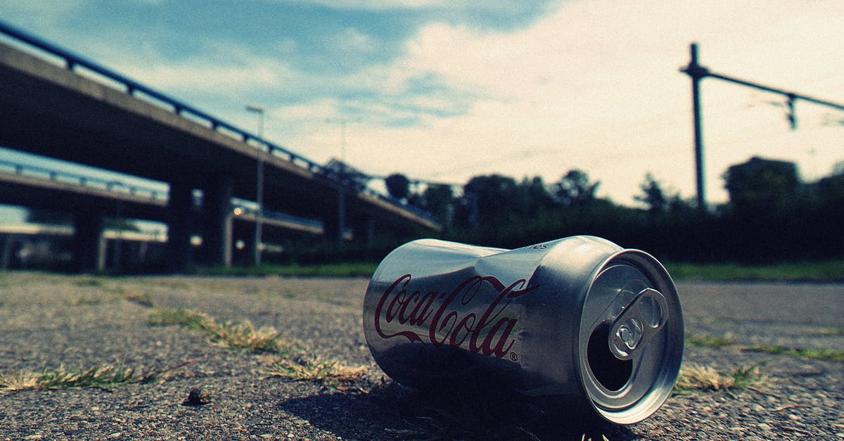 How can I easily get water to a desired temperature? - Shallow Focus Photography of Coca-cola Can