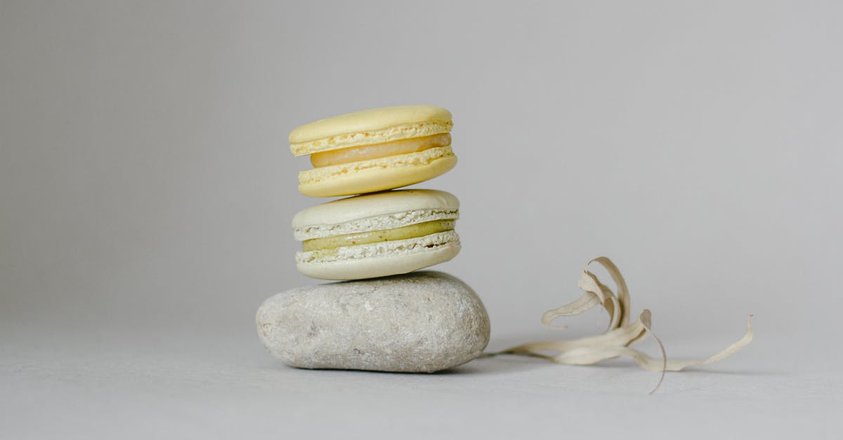 How can I fix my dry crumbly cookie dough? - Delicious macaroons on stone in studio