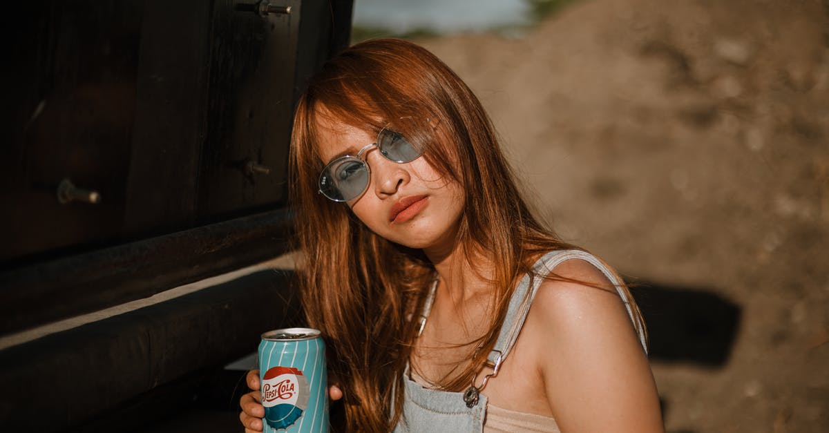 How can I get a better looking crust on my baguettes? - Woman Holding Soda Can