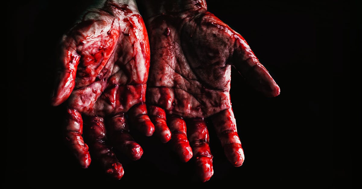 How can I get gross, bloody stumps in my Halloween punch? - Person's Hands Covered with Blood