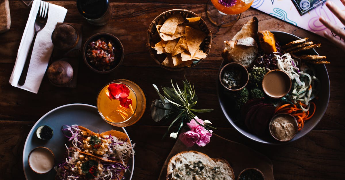 How can I make a quick bread mix less sweet? - From above of tasty tacos near glass of refreshing drinks and vegetable slices with sauces in cafe