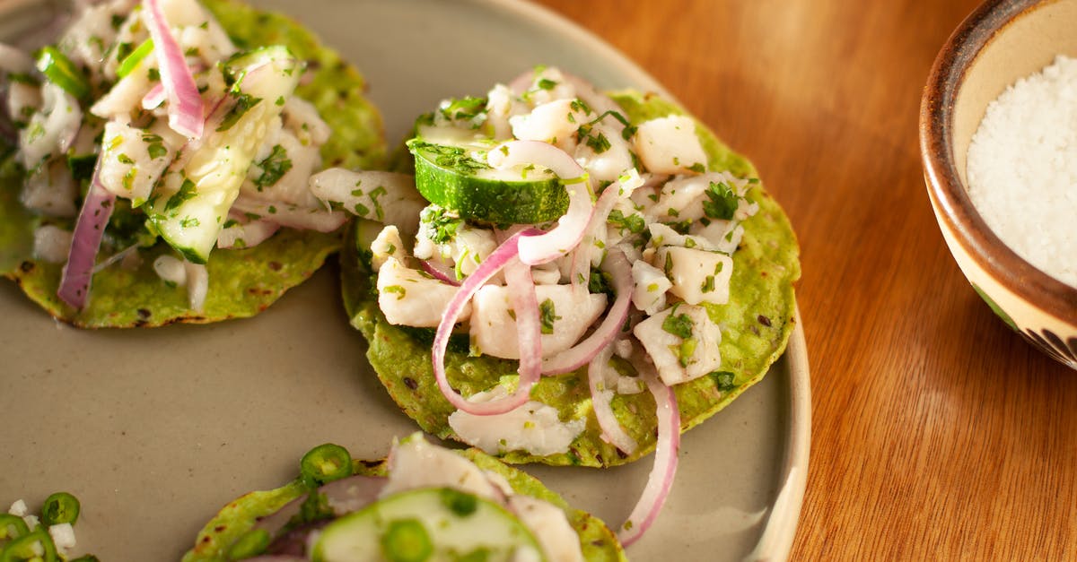 How can I make my baked tortilla chips crispier? - A Plate of Tostadas in Close-up Photography