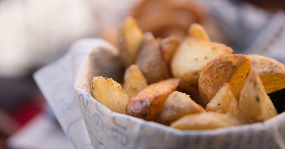 How can I make my homemade potato wedges crispy? - Close Up Photo of Potato Wedges