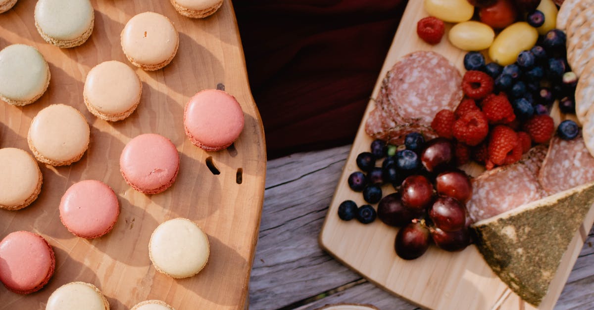 How can I make the tops of my macarons smooth? - White Egg on Brown Wooden Tray