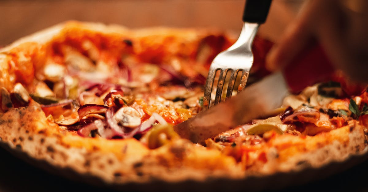 How can I melt cheese for dipping? - Close-up Of A Baked Pie Being Sliced