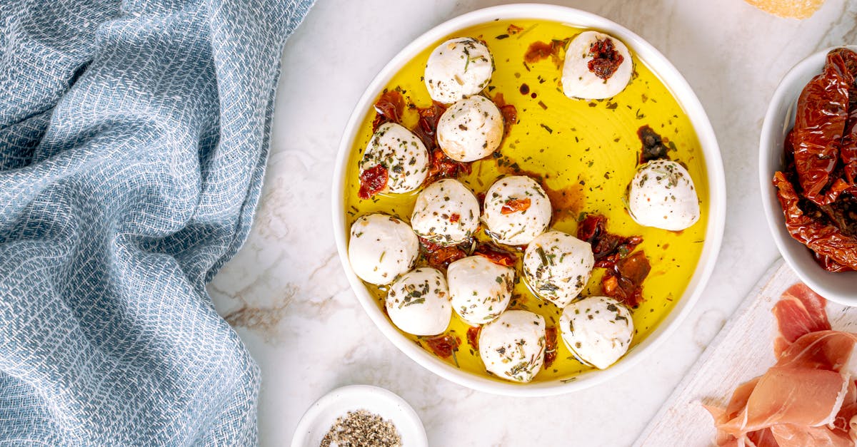How can I melt mozzarella balls? - Marinated Mozzarella in White Ceramic Bowl 