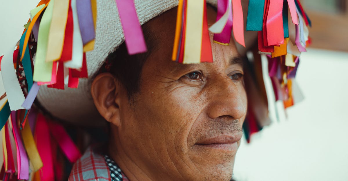 How can I mimic glutinous rice inexpensively in Latin America? - Close-Up Photo Of Man Wearing Traditional Hat