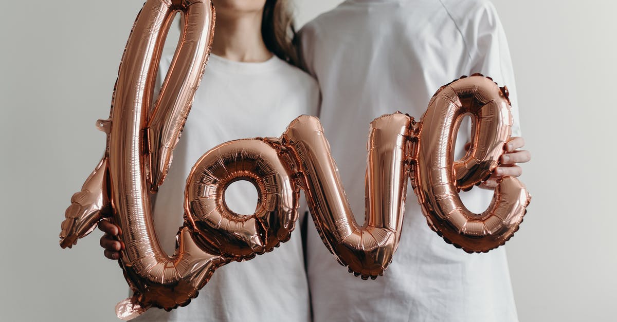 How can I minimize crumbliness in agar based candies? - Woman in White Crew Neck Shirt With Brown and White Heart Shaped Beaded Necklace