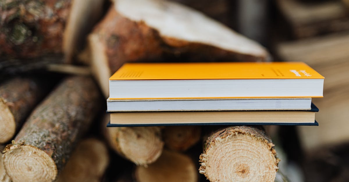 How can I prepare dried minced garlic? - Books placed on edge of freshly prepared woodpile in backyard of countryside house