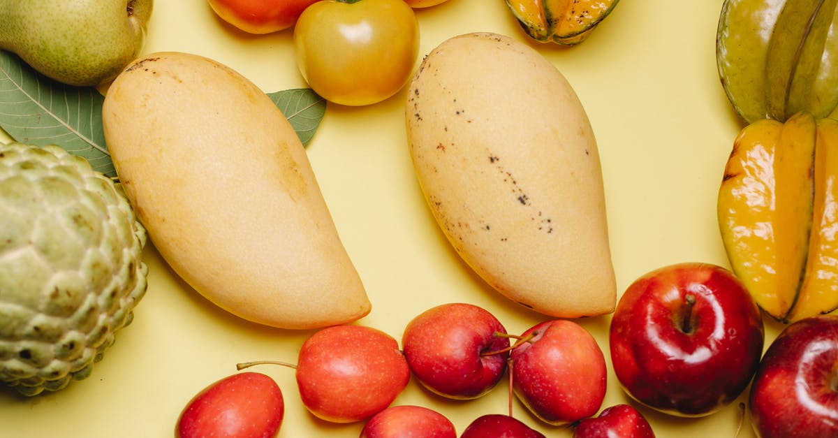 How can I prevent pear juice from soaking into pastry dough? - From above of assorted ripe fresh tasty healthy fruits placed on beige background