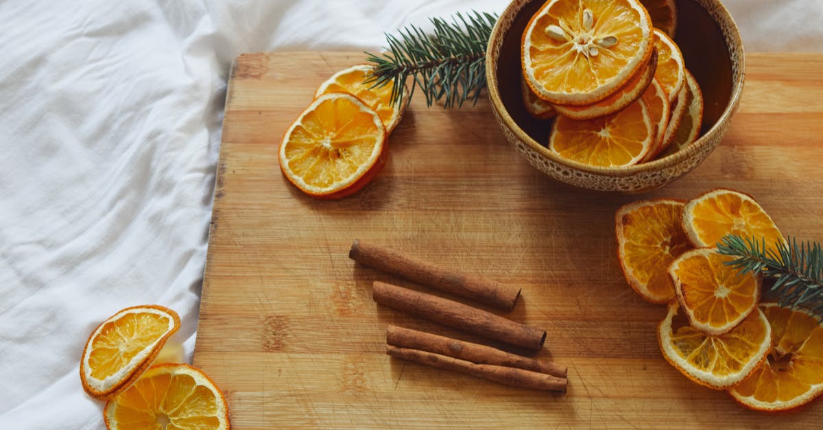 How can I rehydrate a dried navel orange? - Sliced Orange Fruit on Brown Wooden Chopping Board
