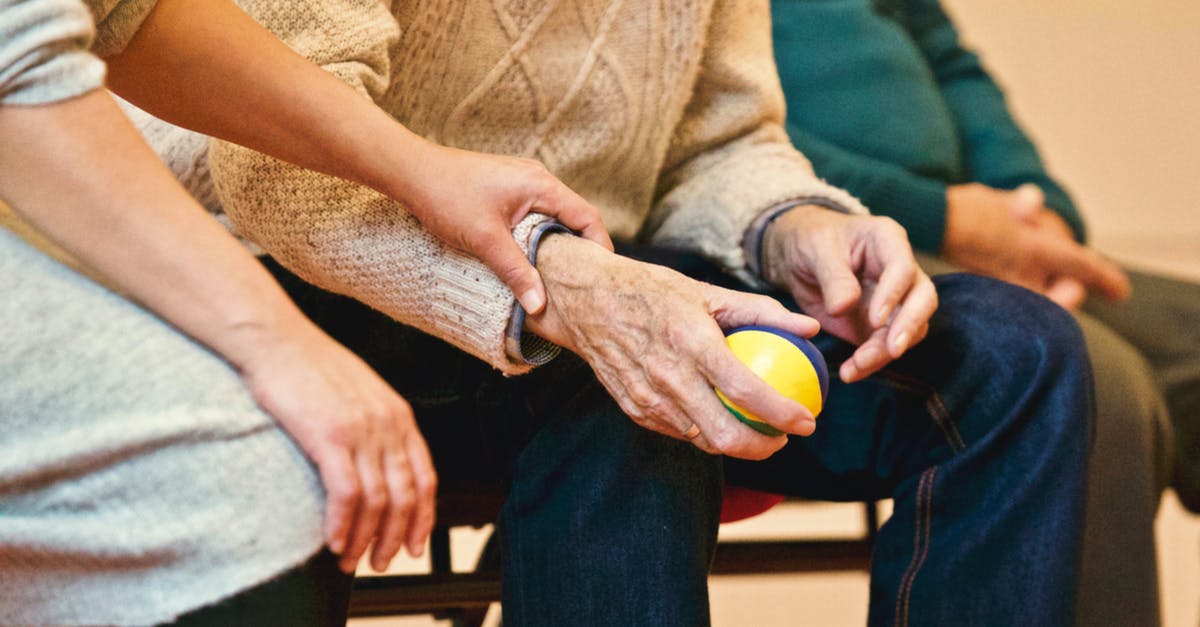 How can I skin hazelnuts at home? - Person Holding a Stress Ball