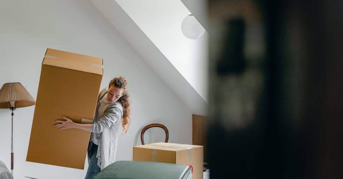 How can I take apart almonds? - Woman carrying boxes in new apartment