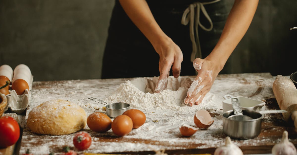 How can I use a "cook for 3-4 hours" slow cooker recipe when I'm away for 8+ hours? - Woman making dough on table How can I use a "cook for 3-4 hours" slow cooker recipe when I'm away for 8+ hours? - Woman making dough on table