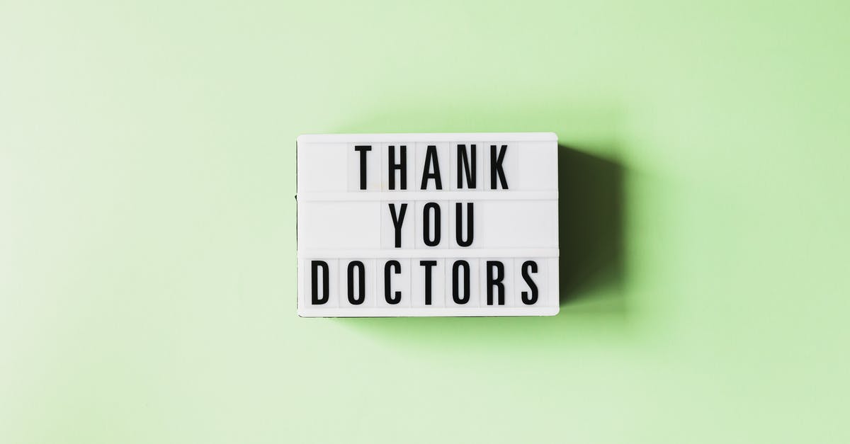 How can you change the environmental factors to change the proportions of sourdough microbiological cultures? - Top view of retro light box with THANK YOU DOCTORS inscription placed on green surface