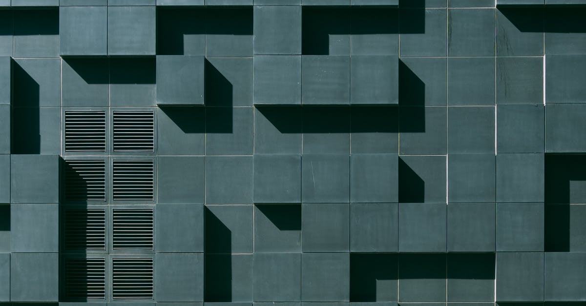 How can you make gray or black butter? - Gray Concrete Building Exterior With Geometric Design
