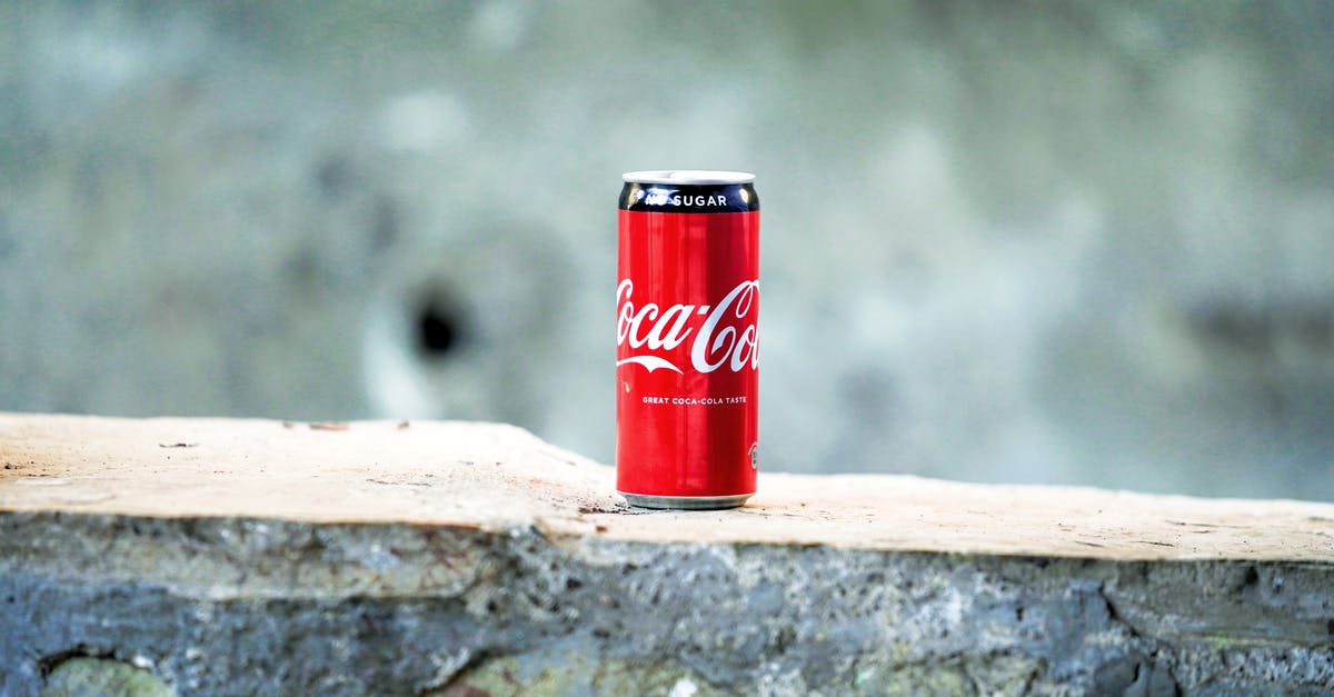 How can you pre-bake coca (pizza)? - Coca-cola Can on Brown Concrete Surface