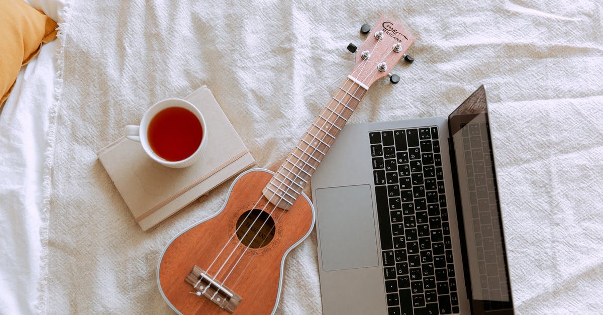 How concentrated can I brew iced tea? - Top view of morning learning ukulele play process in bed