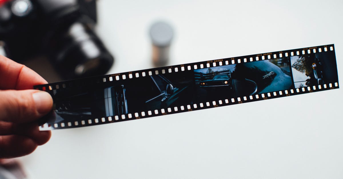 How did I strip the patina off my wok? - Person Holding Film Strip