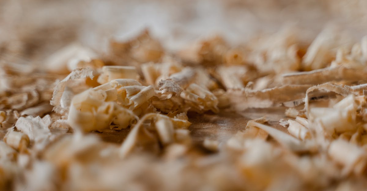 How do I choose between shredded and finely shredded cheddar cheese? - Close-up of Shredded Wood