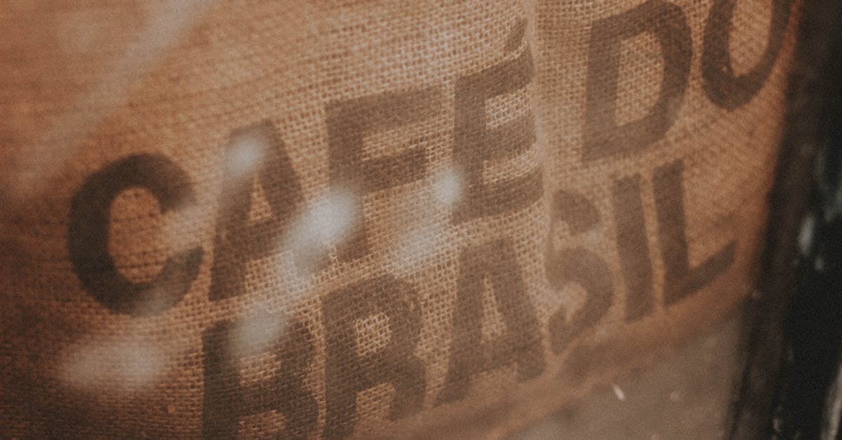 How do I choose to avoid brown stringy fibres in avocado? - High angle closeup of burlap bag with coffee beans and inscription Cafe Do Brasil