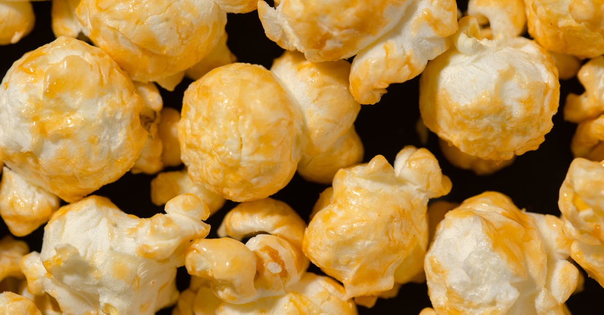 How do I coat popcorn with flavor? - Popcorns in Close-up Shot