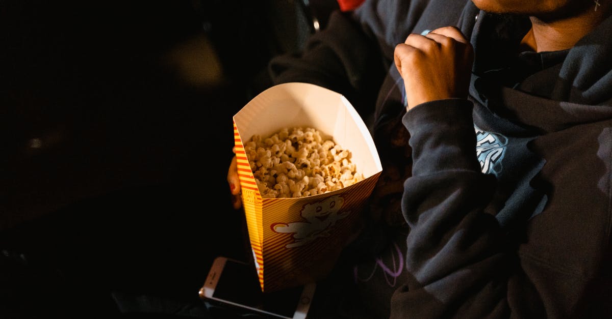 How do I coat popcorn with flavor? - Free stock photo of adult, amphitheater, armchair