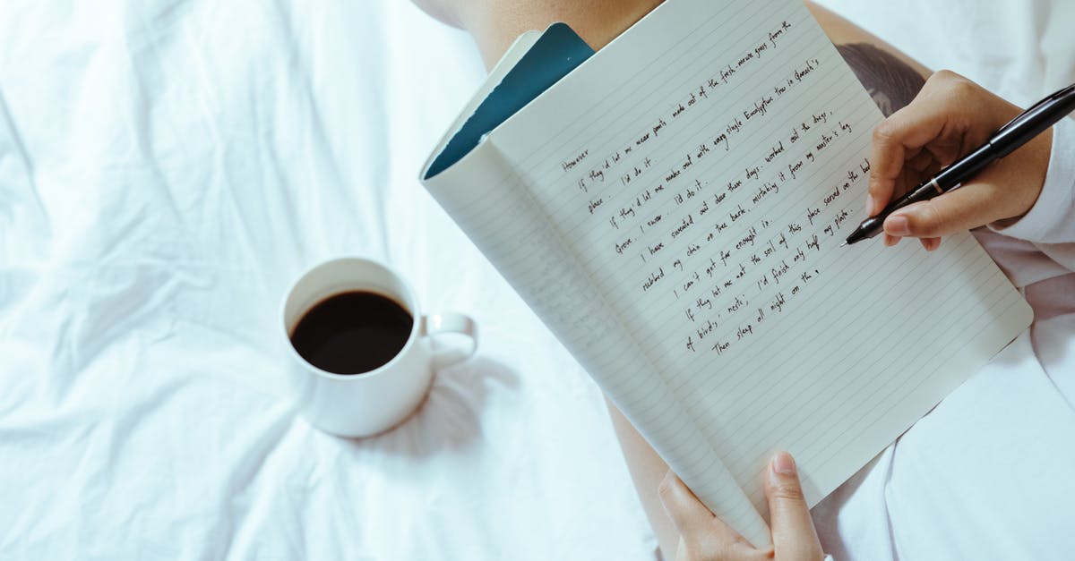 How do I create spherical coffee? - Top view of unrecognizable woman sitting on bed with legs near cup of coffee and writing on notepad with pen while resting at home