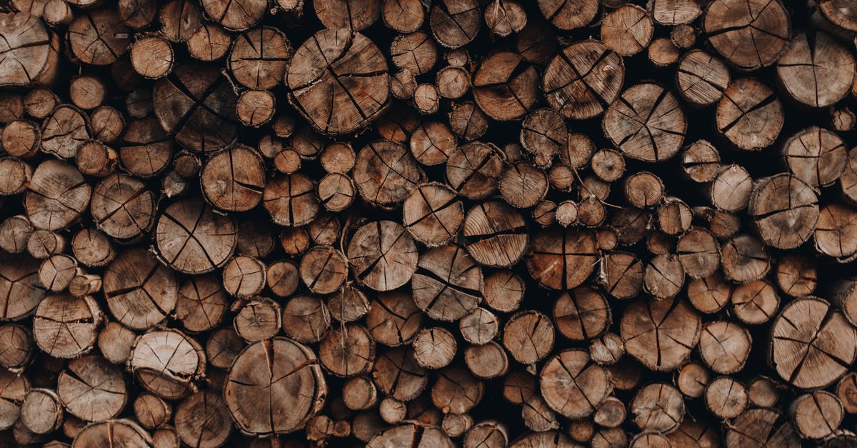 How do I cut bones in preparing a fast brown stock ("fond brun rapide")? - Pile of wooden skids with cracks stacked accurately in rows arranged for cutting