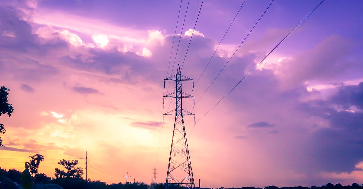 How do I distribute fillings evenly in flan/pudding mix? - Photography of Electric Tower during Sunset