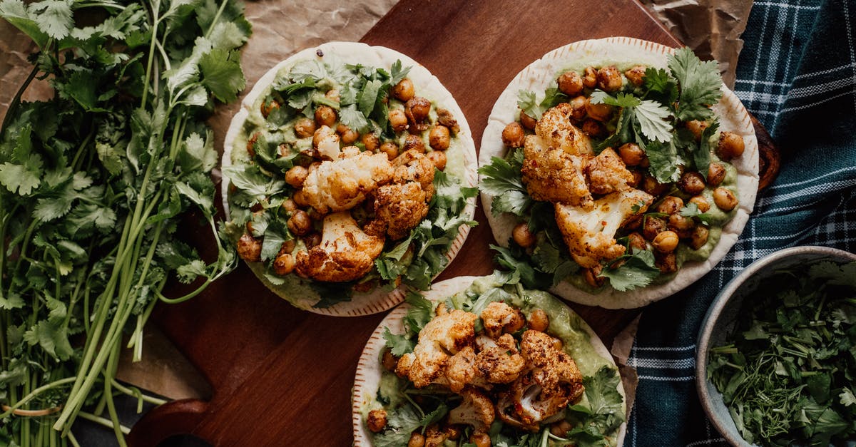 How do I ensure that pita forms a nice big, even pocket when baking? - Free stock photo of baked cauliflower, baked chickpeas, bowl