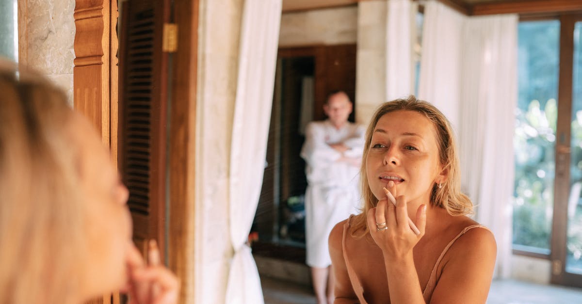 How do I get better at tasting? - Woman Getting Ready and Doing Her Makeup 