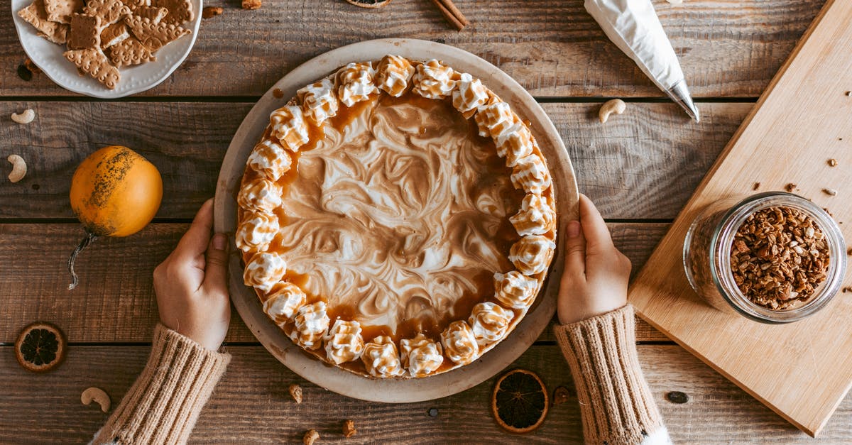 How do I get homemade mayonnaise to taste like store bought mayonnaise? - Top view crop anonymous female in sweater serving freshly baked yummy pie with whipped cream on wooden table How do I get homemade mayonnaise to taste like store bought mayonnaise? - Top view crop anonymous female in sweater serving freshly baked yummy pie with whipped cream on wooden table