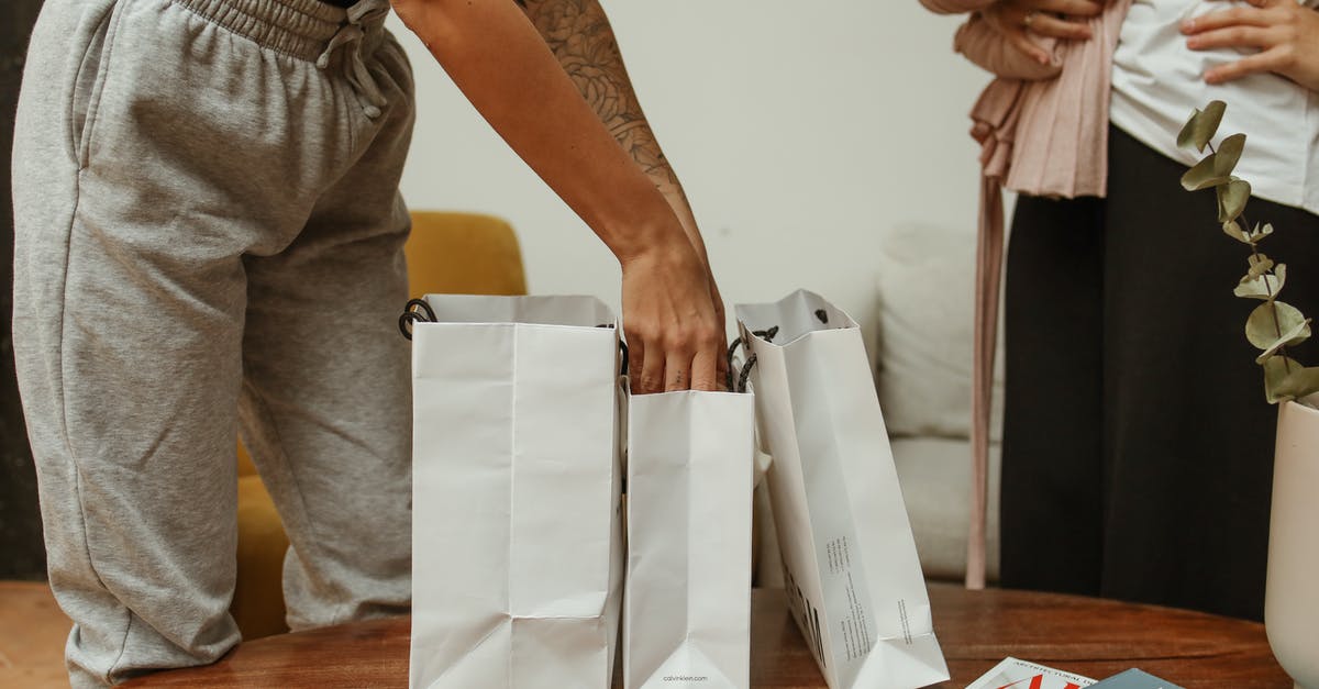 How do I get paper-skin duck breast? - Person in Gray Pants with Hand Inside White Paper Bag