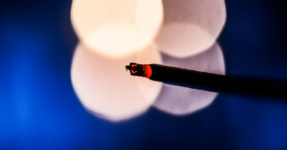 How do i get rid of burnt smell from kheer? - Lighted Cigarette Stick With Bokeh Photography