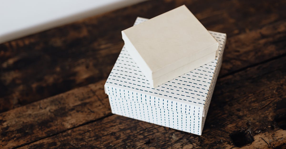 How do I keep a custard from breaking? - Stack of boxes on wooden table