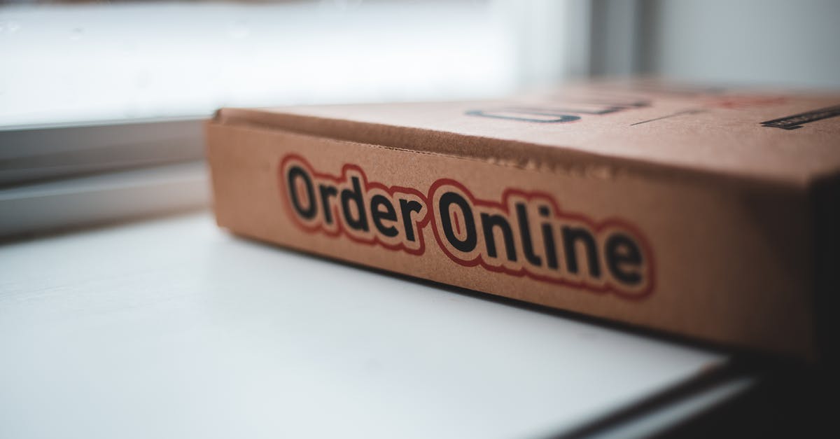 How do I know if a Hello Fresh shipment is ... fresh? - Soft focus of cardboard box of delivery pizza online service placed on white windowsill in daylight