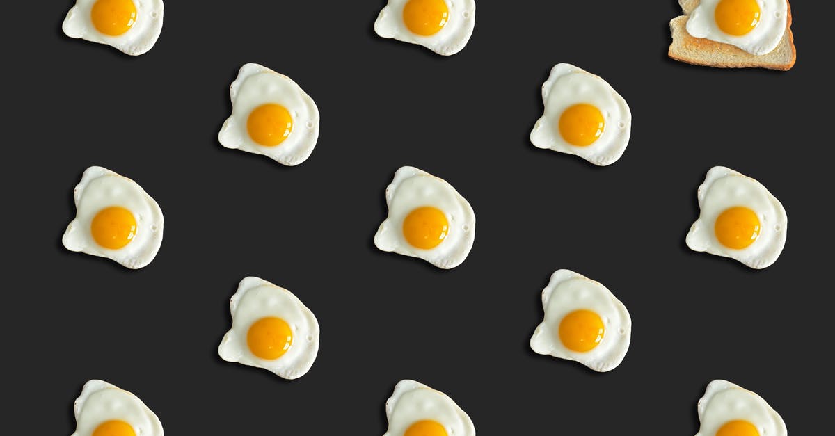 How do I leave fried eggs intact? - Cooked Eggs on Black Background