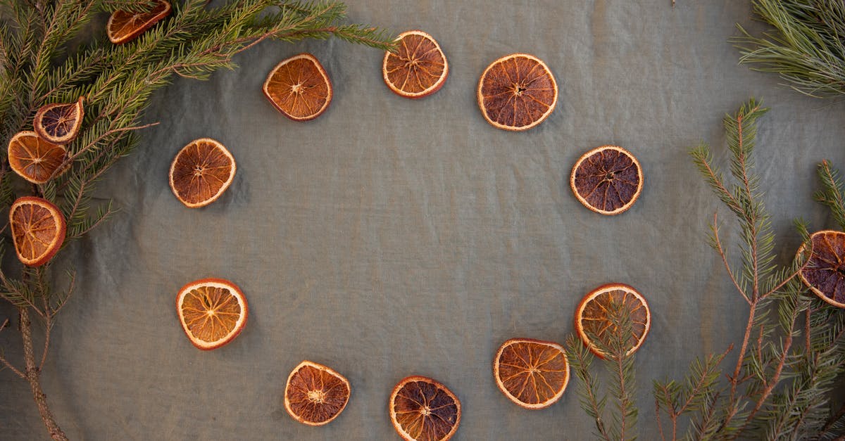 How do I make dried blueberries? - Sliced Orange Fruits on Gray Textile