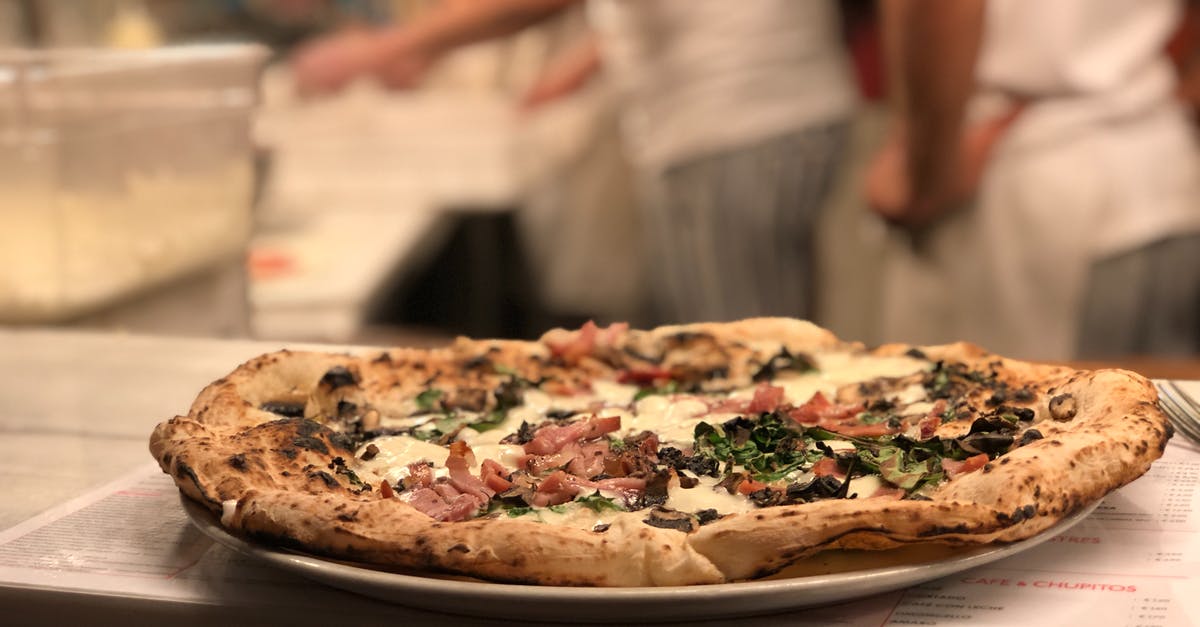 How do I make this particular pizza dough? - Pizza on Brown Wooden Table