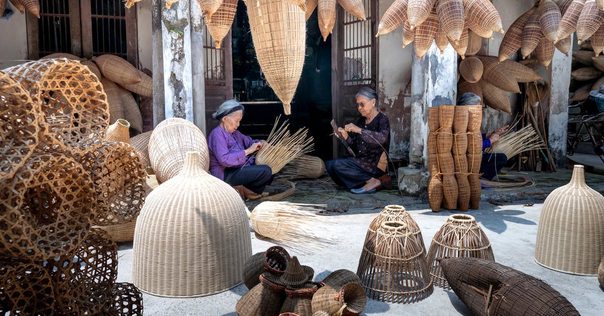 How do I make Vietnamese Yogurt more tart? - Elderly Vietnamese women working and making wicker bamboo fish traps