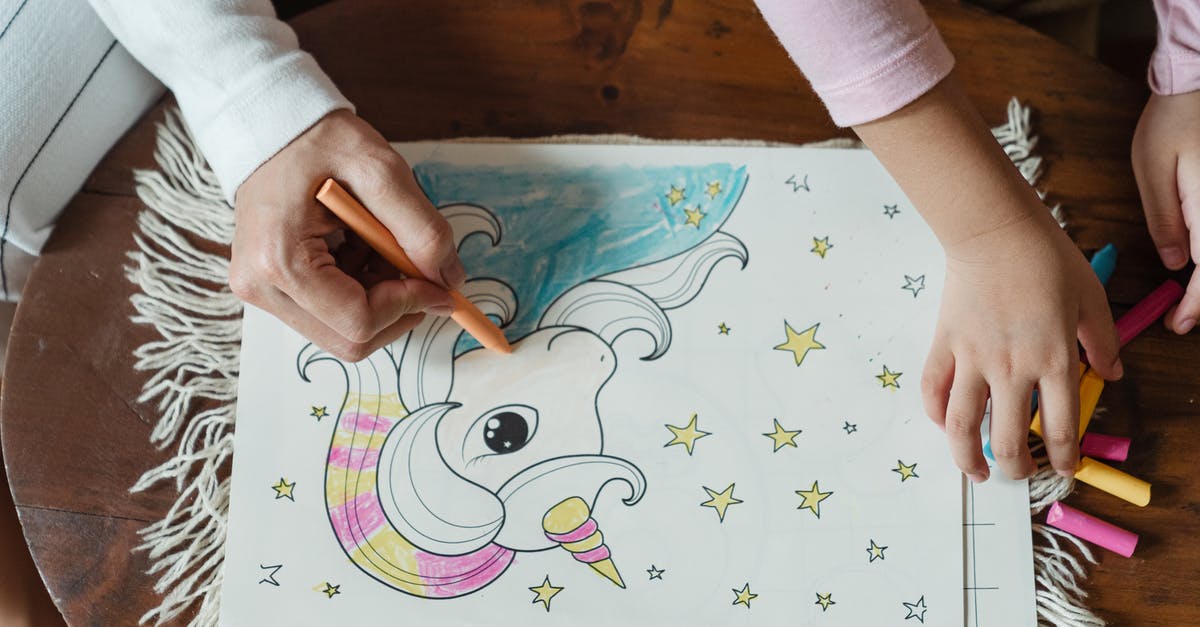 How do I peel prosciutto from wax paper without it coming off in strips? - From above of crop anonymous mother and daughter coloring picture with unicorn with wax crayons on coffee table