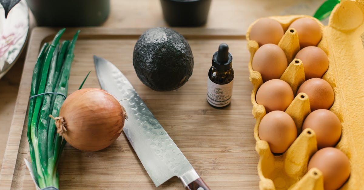 How do I press avocadoes to make avocado oil? - Silver Knife Beside Poultry Eggs