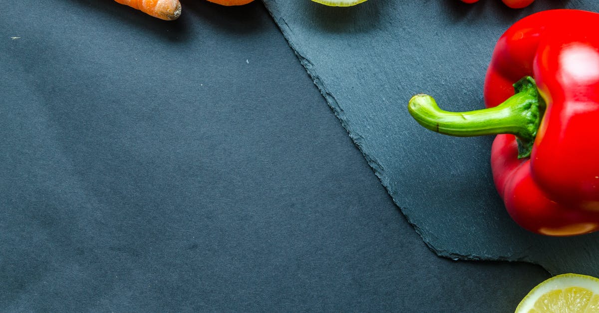 How do I properly cut a bell pepper into a medium dice? - Close-Up Photography of Vegetables and   Fruit